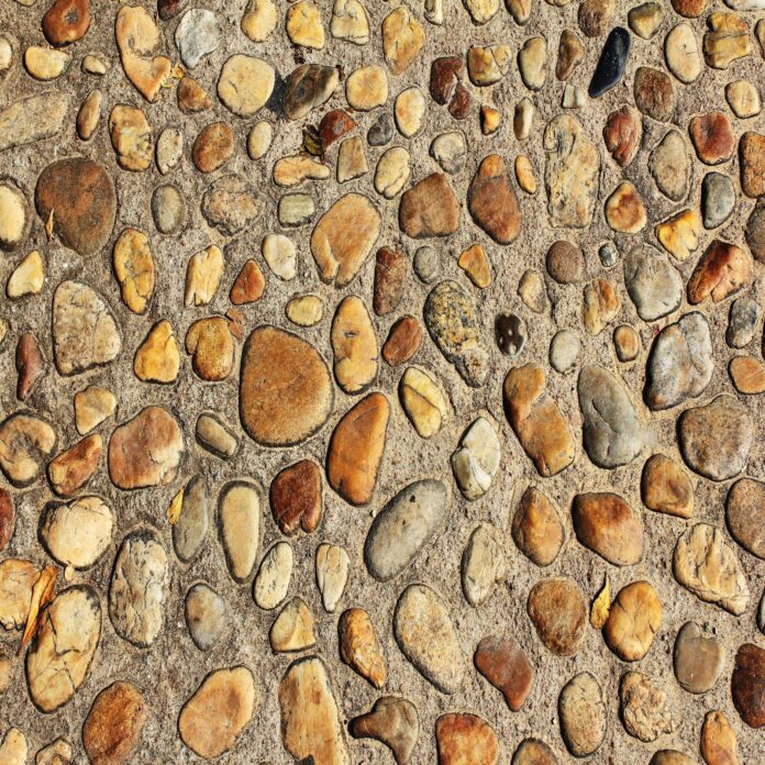 Texture bề mặt đá cuội lát nền tự nhiên tông màu đất ấm áp độ phân giải cao